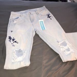 flower jeans with knee rips